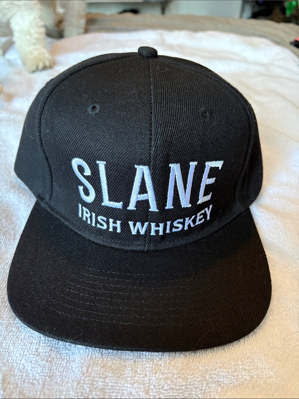 SLANE Black Snapback Hat with White Embroidered Logo
